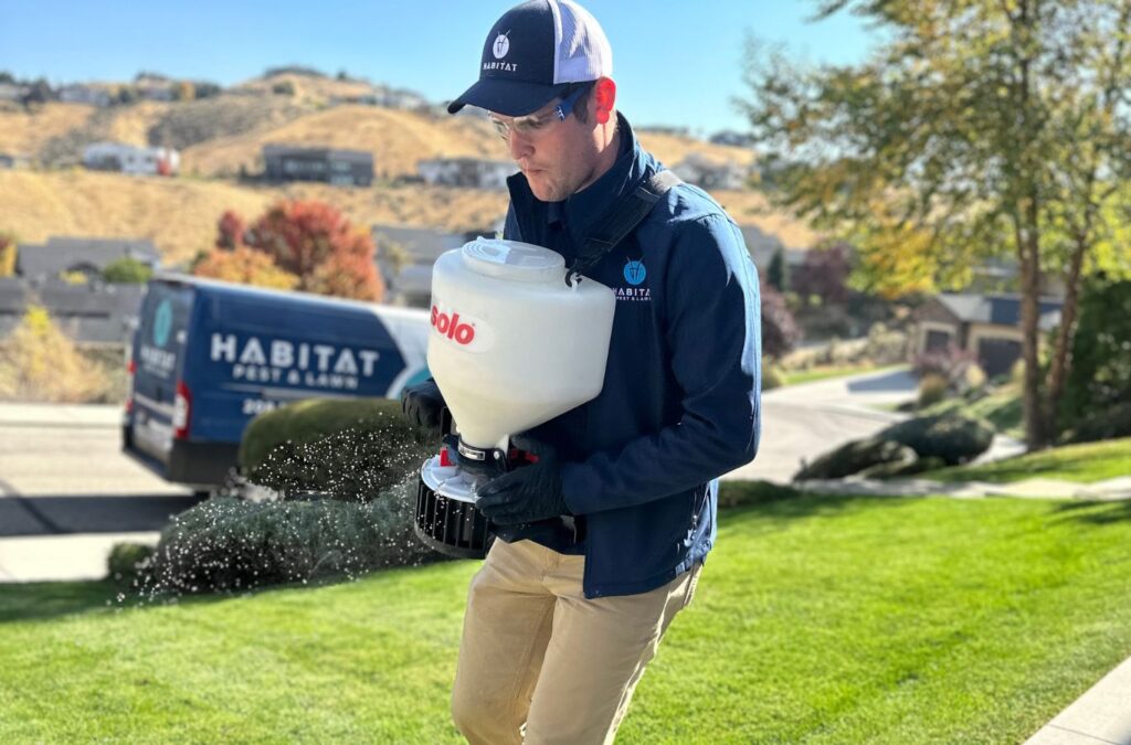 A Habitat Pest & Lawn team member providing pest control in Star, ID, showing the benefits of choosing a local, eco-conscious professional.